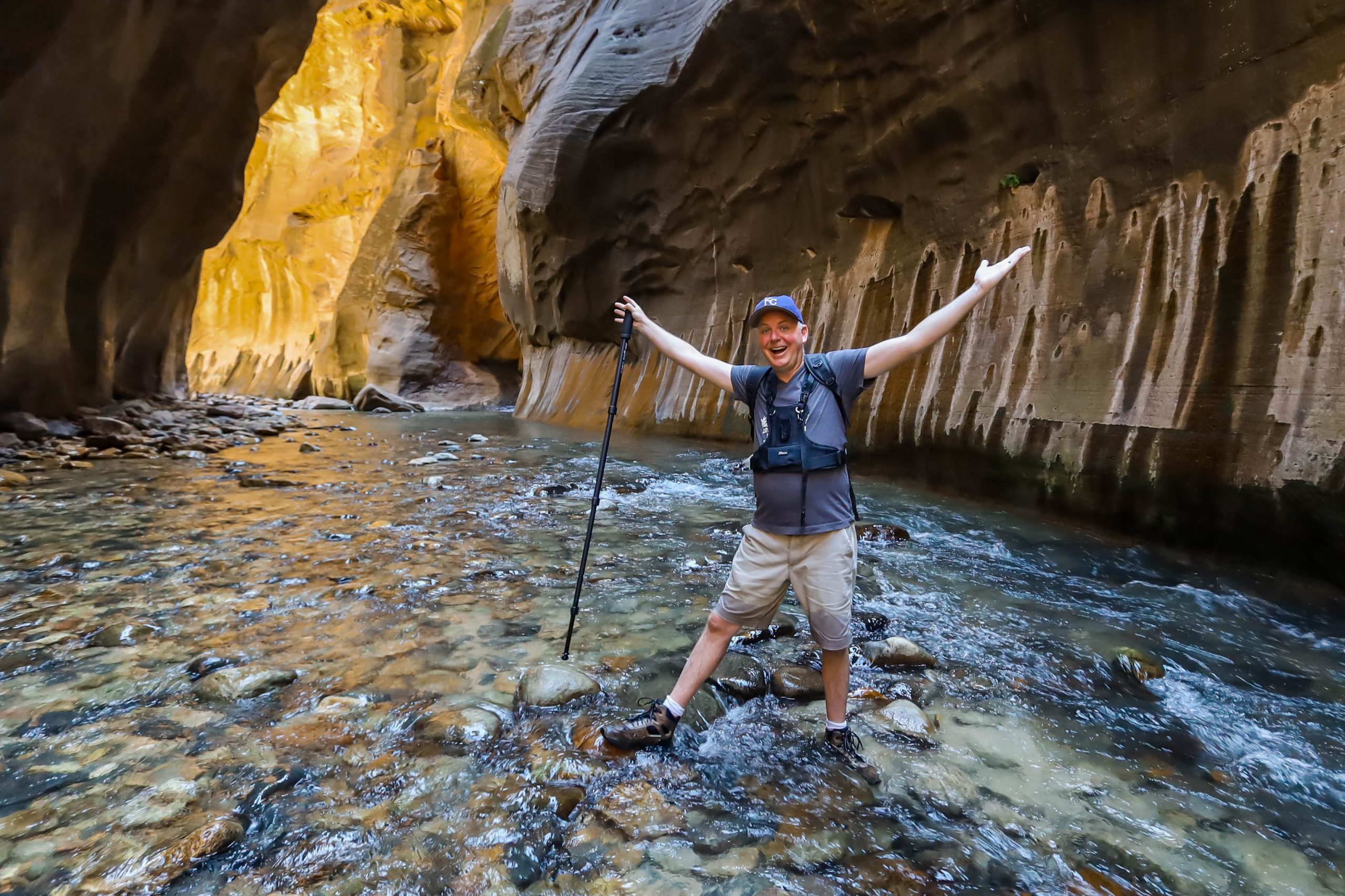 Photographer Tim McMahan exploring the Narrows at Zion National Park