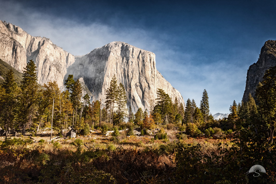 Morning mist begins to burn off of El Capitan at Yosemite National Park.